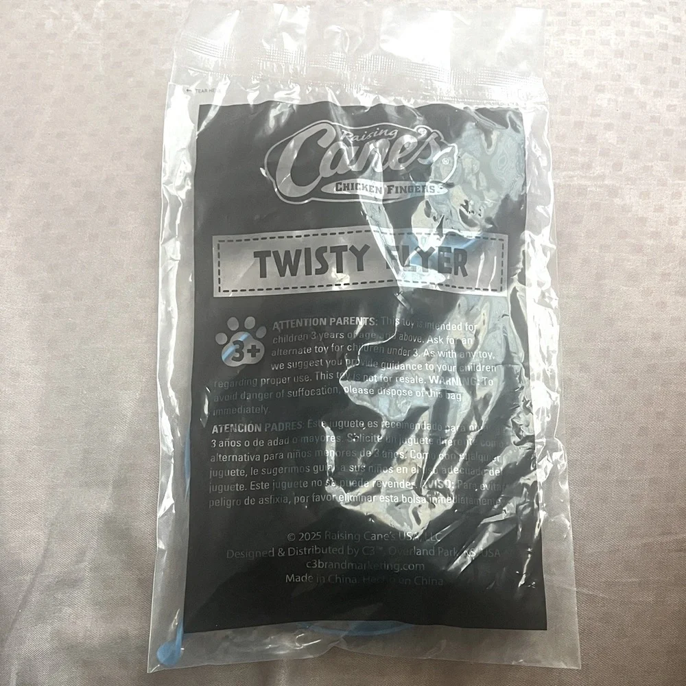 NWT New Raising Cane’s Twisty Flyer Kids Meal Toy - Picture 1 of 4